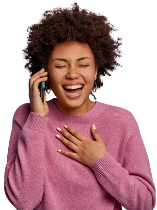 Laughing woman using phone